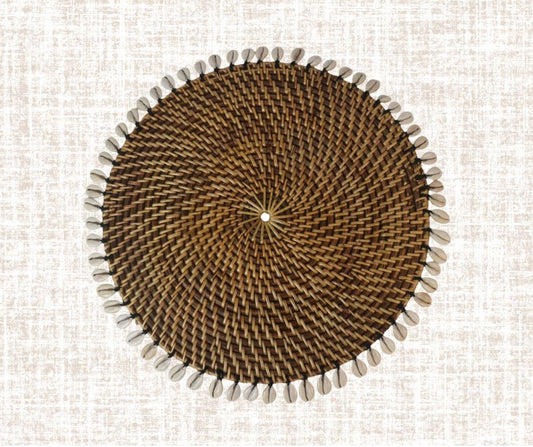 Rattan placemat with cowrie shells