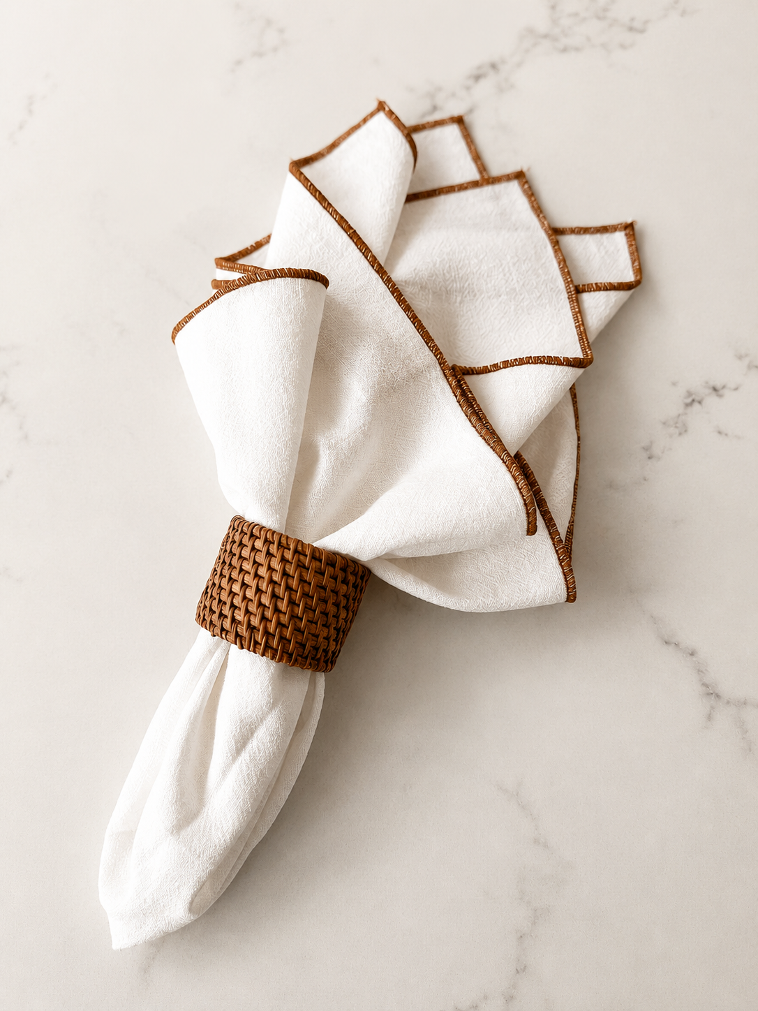 Ivory napkin set with coloured trim