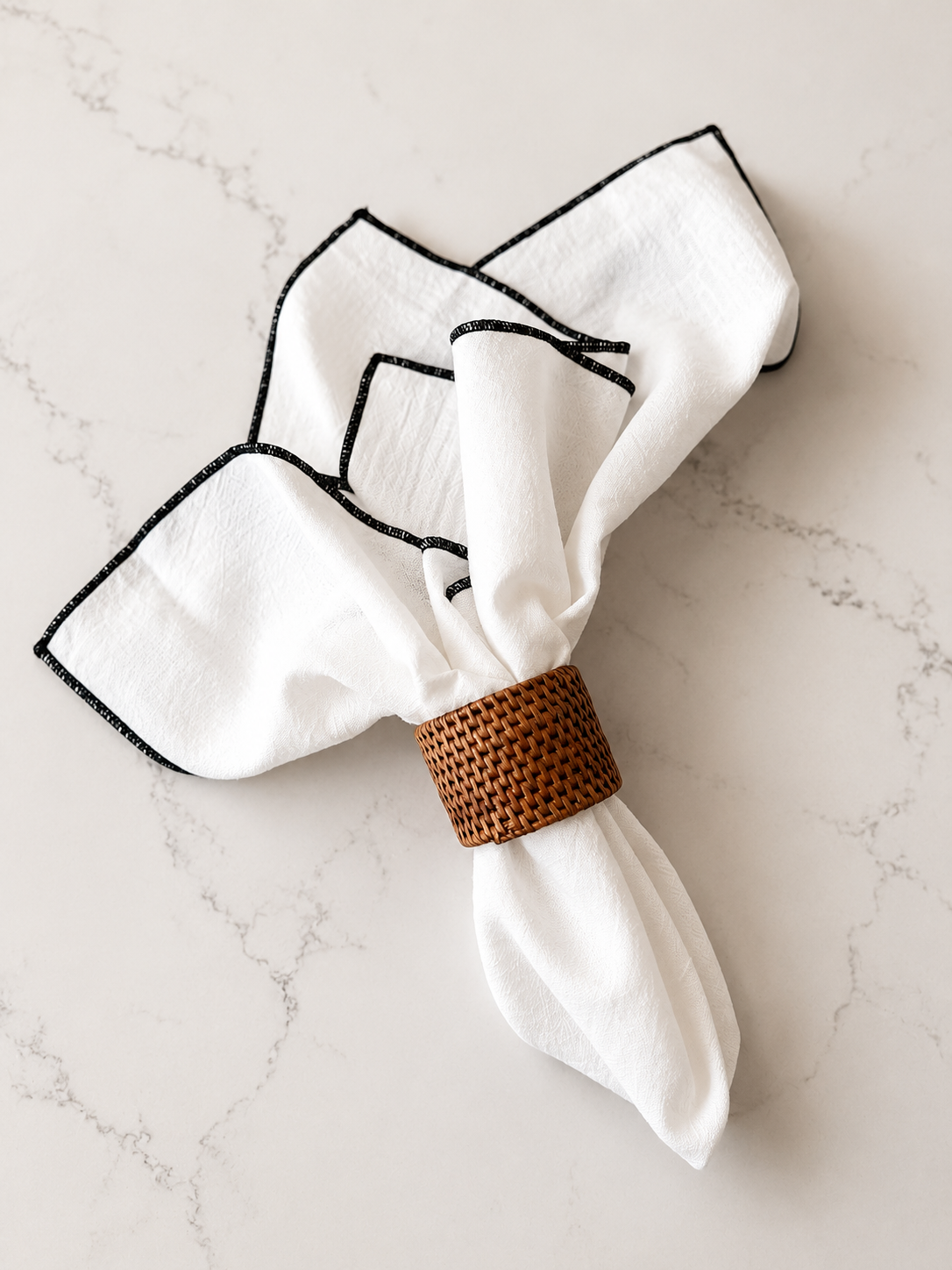 Ivory napkin set with coloured trim