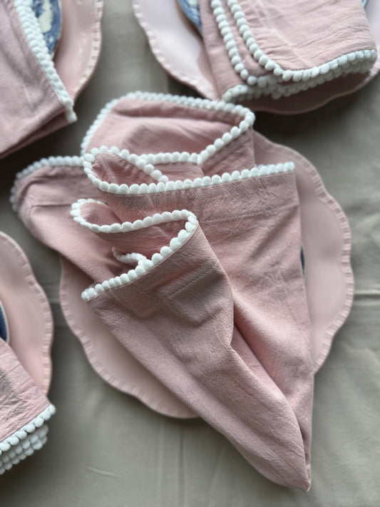 Rosé pompom napkins